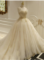 Champagne Ball Gown Tulle Spaghetti Straps Backless Wedding Dresses