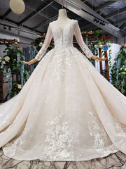 Fabulous Champagne Ball Gown Tulle Appliues Long Sleeve Beading Wedding Dresses