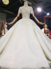 Find The Perfect Light Champagne Tulle Short Sleeve Backless Appliques Beading Wedding Dresses