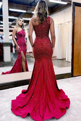 sparkly burgundy beaded one shoulder long prom dress with slit